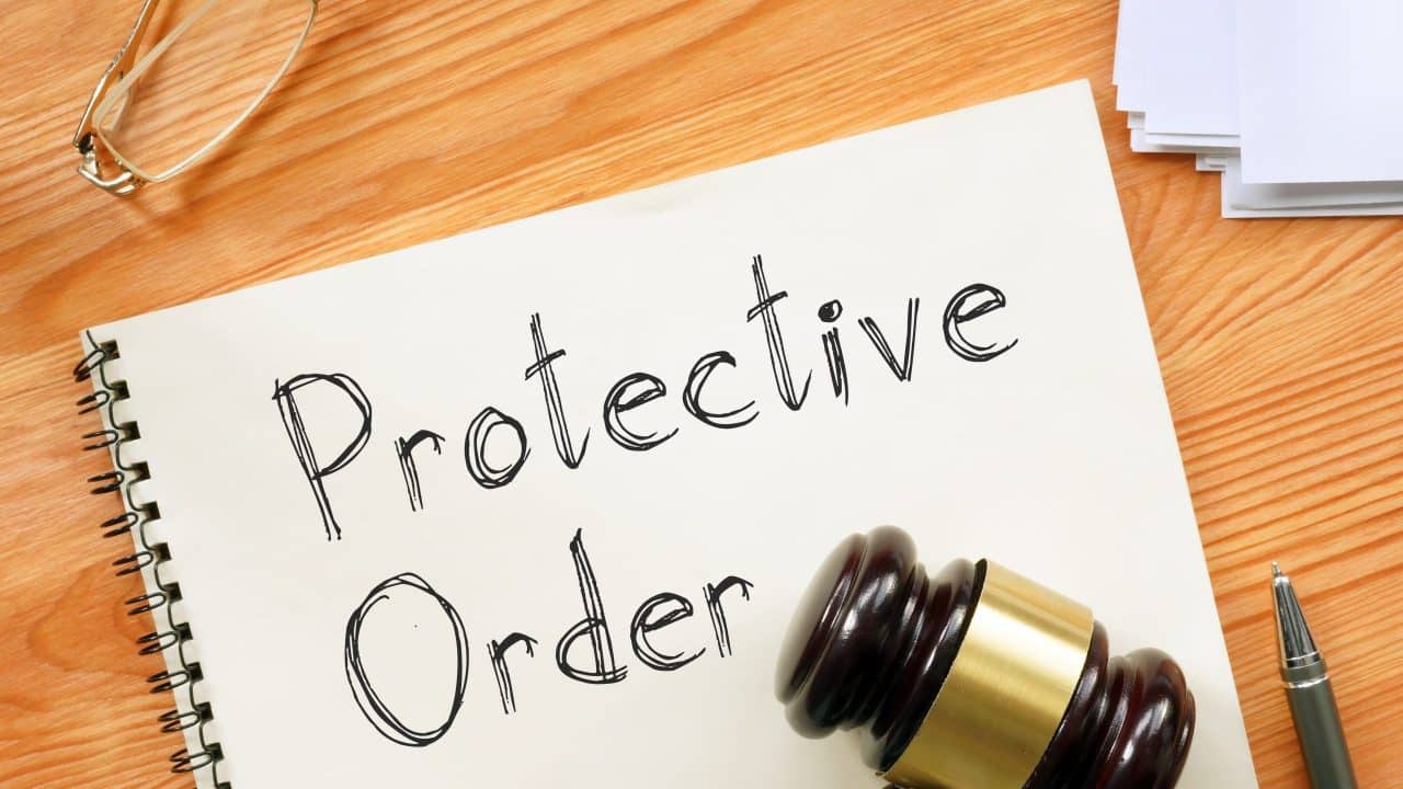 Protective Order Is Shown On A Photo Using The Text